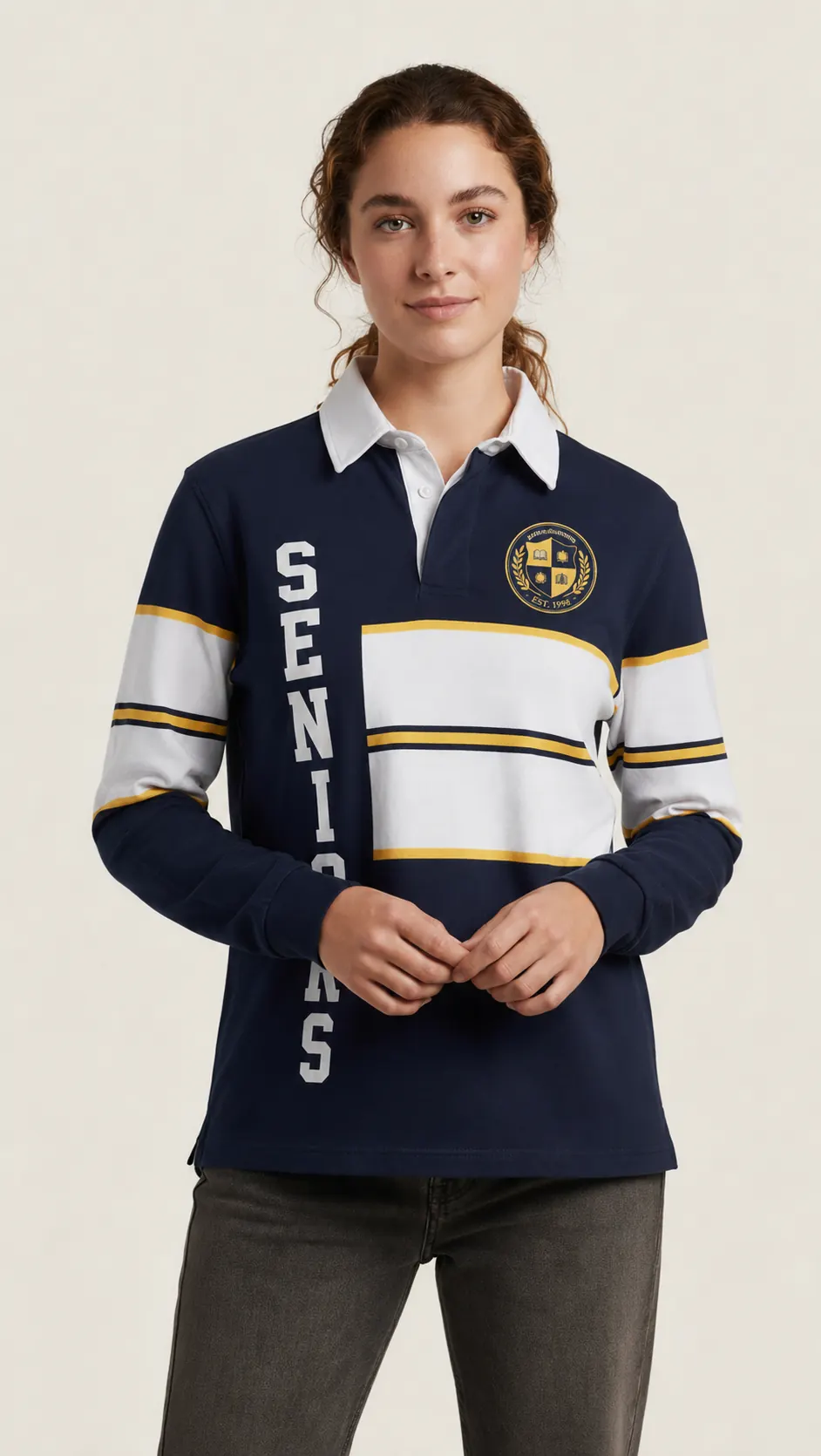 Student wearing a custom navy and white School Leavers rugby jersey with 'SENIORS' vertical print and school crest